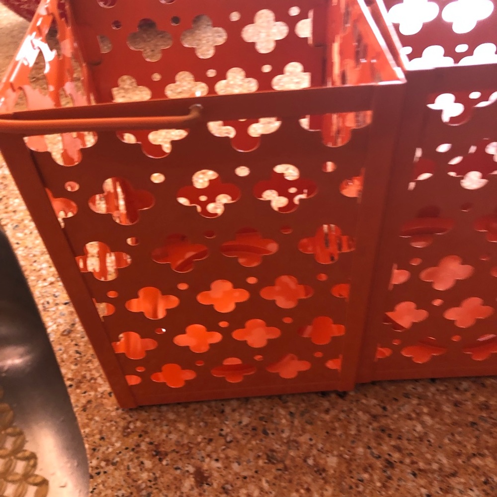 Yankee candle orange metal candle holders.